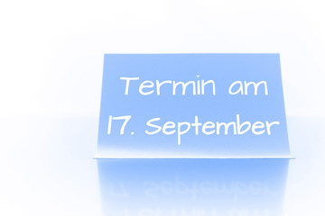 Termin am 17. September - blauer Zettel mit Notiz