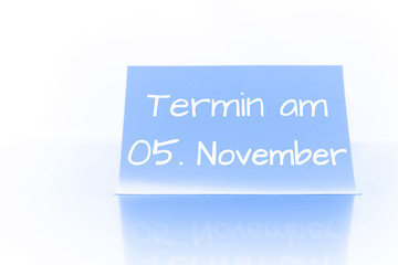 Termin am 5. November - blauer Zettel mit Notiz