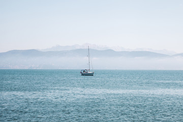Fototapeta premium Boat in Mediterranean sea by Italy coast.