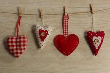 Heart shape decorations hanging on thread
