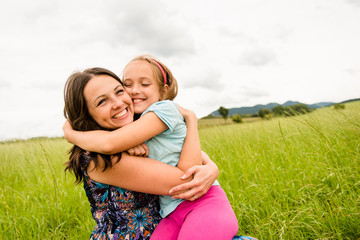 Love - mother and daughter hugging