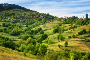 Spring is coming... Amazing spring view with a little village in Rhodopi Mountains, Bulgaria – Image. Magnificent landscape, green fields, small houses.
