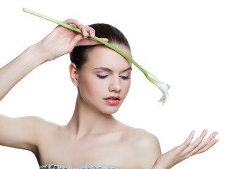 Fototapeta premium Healthy woman holding flower isolated on white background, spa portrait. Facial treatment, cosmetology, beauty, skin care and spa concept