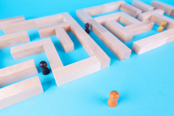 People in the maze, finding a way out. The man in the maze.
