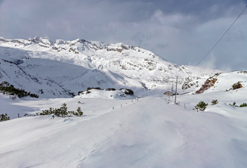 Panoramic view of a winter mountain landscape.