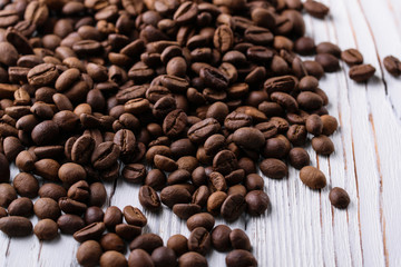 coffee beans on wooden background
