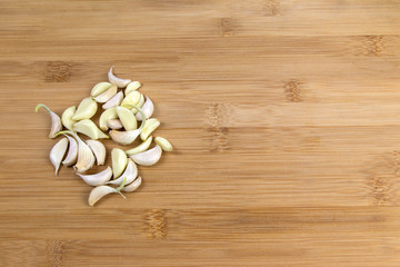 Garlic whole on wooden surface