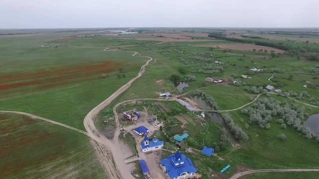 Blue Church in the steppe. Video from the air.