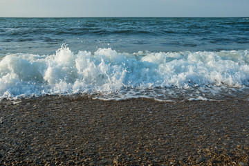 Outstanding beautiful sea breeze. Azov of Sea in the Crimea. Exciting sea waves with splashes.