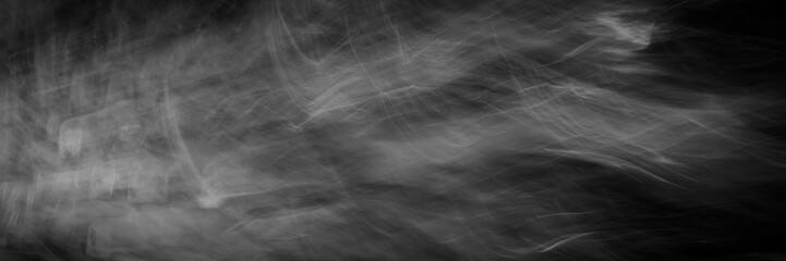 abstract white lines on a black background.