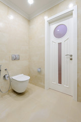 Fototapeta na wymiar Bright bathroom interior with toilet