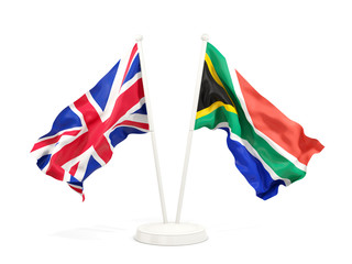 Two waving flags of UK and south africa