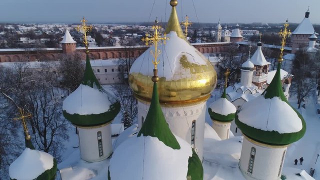 Domes and crosses of the Transfiguration Cathedral in Suzdal, Russia.