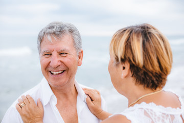 Happy senior couple on the beach