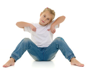 Little girl in a white T-shirt.