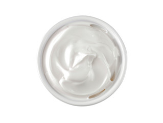 Mayonnaise in a white ceramic bowl on a white isolated background. white sauce. close-up. view from above