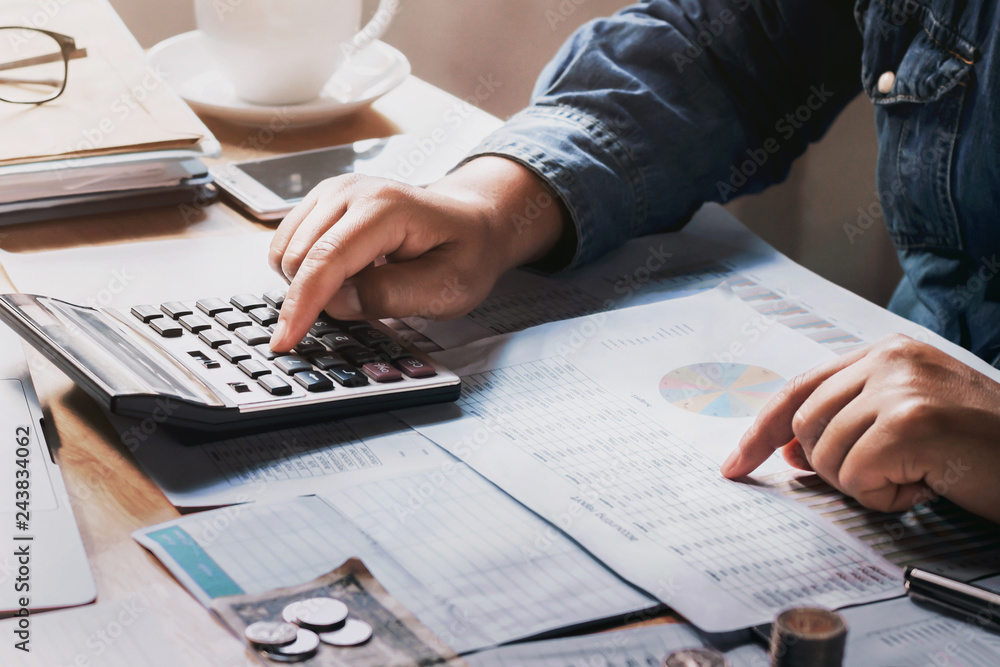 Poster businessman using calculator for calculate budget. concept finance