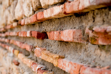 old brick wall of red bricks