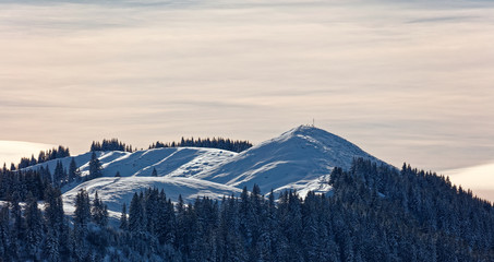 Tourist at summit of Hohe Kugel