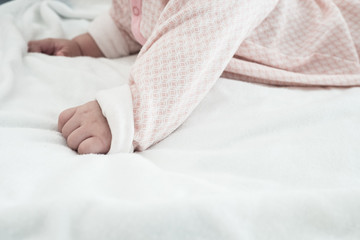 Baby hand  on blanket background for text space