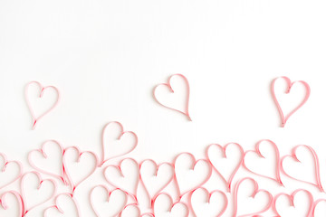 Pink hearts on white background. Flat lay, top view Valentines Day background love concept.