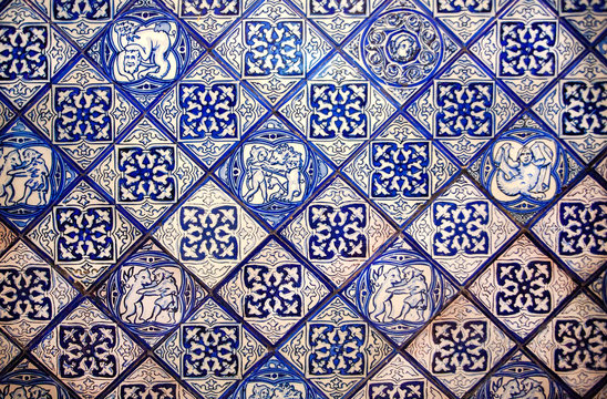 Patterned spanish design of old house tile. Historical walls decoration in Spain