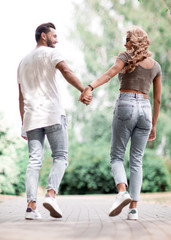 couple in love on a walk in the city Park