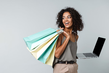 Happy young african woman casually dressed - Powered by Adobe