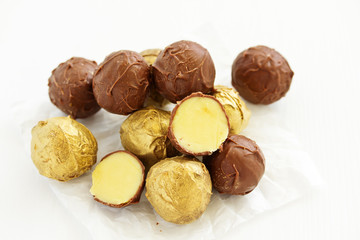 Handmade candies. Lawyer truffle with liqueur and vanilla. Home sweetness. Selective focus.