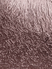 beautiful crumpled rose gold foil background, glossy metal background rose pink color, monochrome texture background with shiny and matte surface copper color