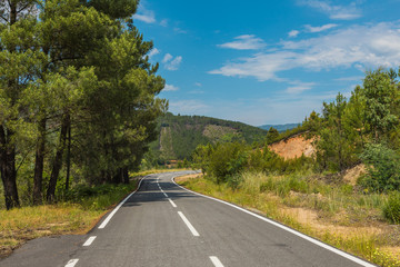Road in the middle of nature without cars.