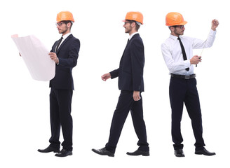 in full growth .a qualified architect in an orange helmet