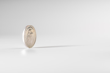 Currency rotating on white background, concept of American economy.