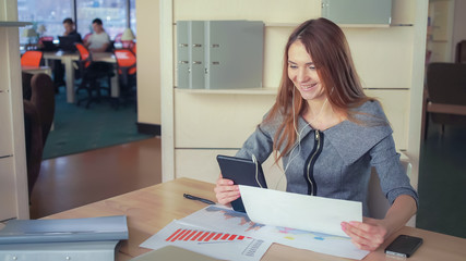 By means of social networking a businesswoman negotiates with a receiver to solve some work...