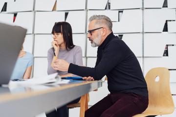 Candid portrait of metro man in office meeting