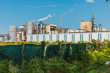 Fototapeta premium Industry with chimneys and smoke