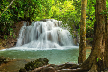 Beautiful and Breathtaking green waterfall at the tropical rainforest, Erawan's waterfall, Located Kanchanaburi Province, Thailand