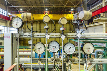 Sensors and devices indicating the parameters of hot water in the heating system of a large house.