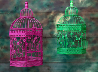 Colorful empty bird cages