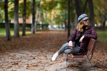 Fototapeta premium woman sitting in the park
