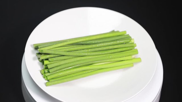 stem of garlic rotating