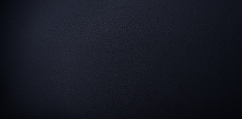 Grunge metal black background, dark texture. Panoramic industrial close up view