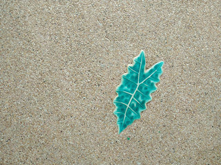 Terrazzo floor with inner ceramic leaves for background