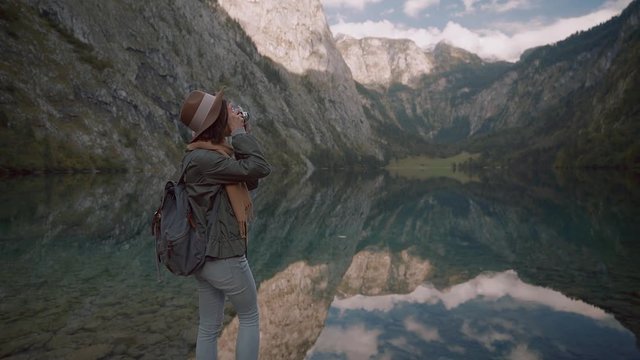 Young girl with a retro camera in Obersee