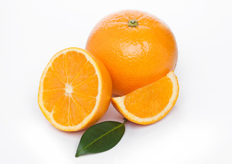 Fototapeta na wymiar Fresh organic raw oranges with peeled halves