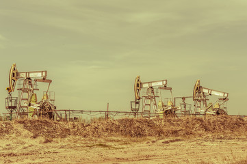 Pump jack. Extraction of oil. Petroleum concept.