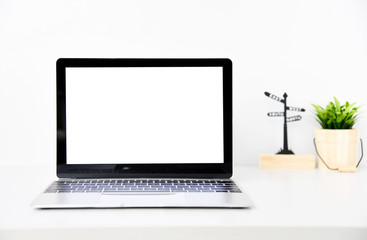 front view Laptop computer on office desk with copy space