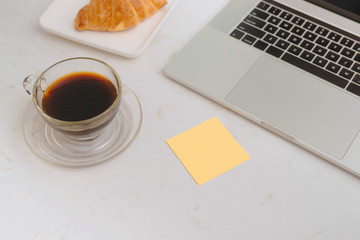 Pen and notebook with laptop.Inspiration moment,workspace or coffee break in the morning/ selective focus