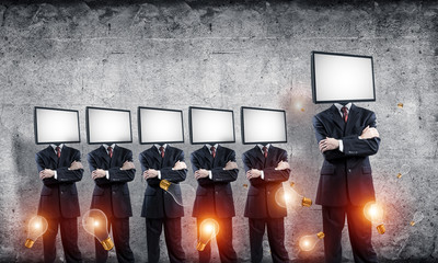 Businessmen with TV instead of head.