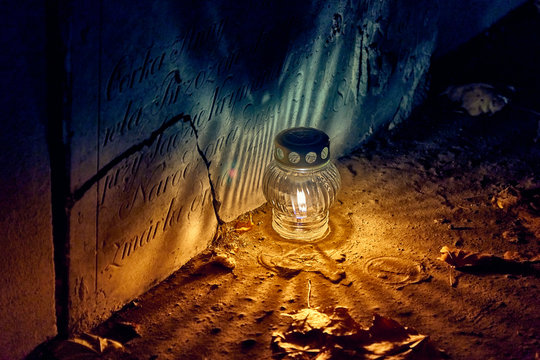 Memento mori - lights and graves on All Saints' Day in the Powazki Cemetery (Polish: Cmentarz Powazkowski) - is a historic cemetery located in the Wola district, western part of Warsaw, Poland.